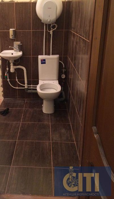 Будівля діючого магазину в центрі районного центру, 50 кв.м