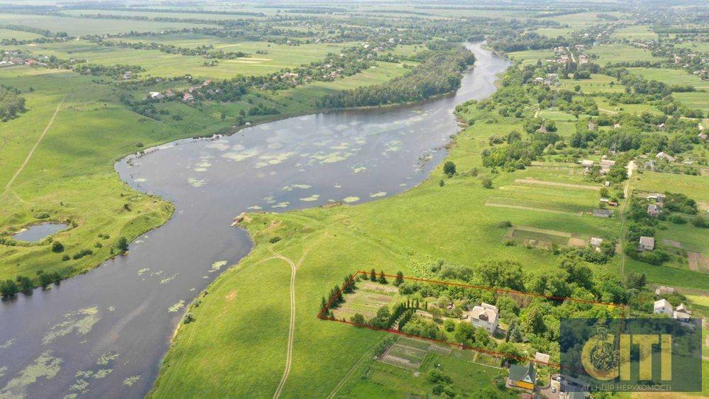 Продається будівля під базу відпочинку або пансіонат на березі річки, ділянка 65 соток